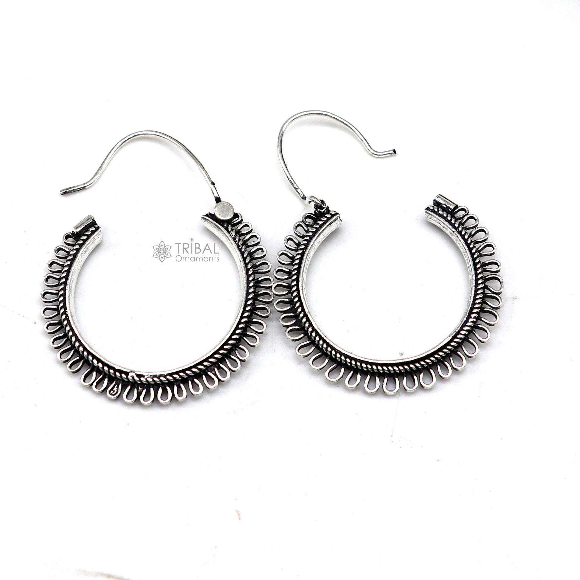 Sterling silver tribal earrings with unique round hoop design, ethnic hanging style, crafted by TRIBAL ORNAMENTS.