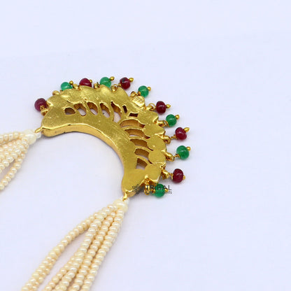 Sterling silver India traditional kundan work pendant with multiline pearl strings and peacock design in jewelry set.