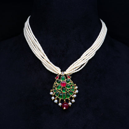 Sterling silver India traditional kundan work pendant with peacock design, decorated with multiline pearl strings in jewelry set.