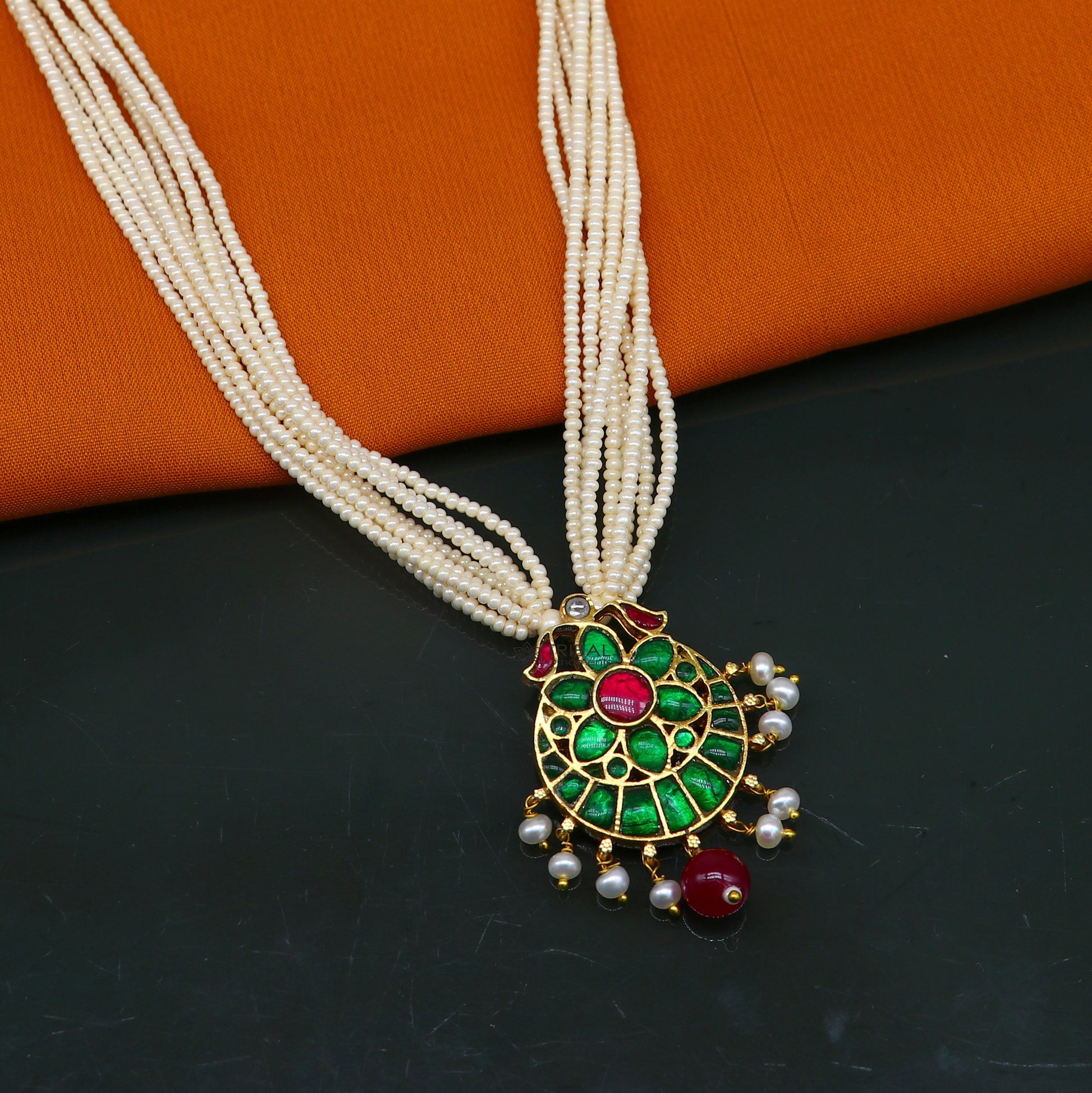 Sterling silver India traditional kundan work pendant with multiline pearl strings and peacock design in jewelry set by Tribal Ornaments.