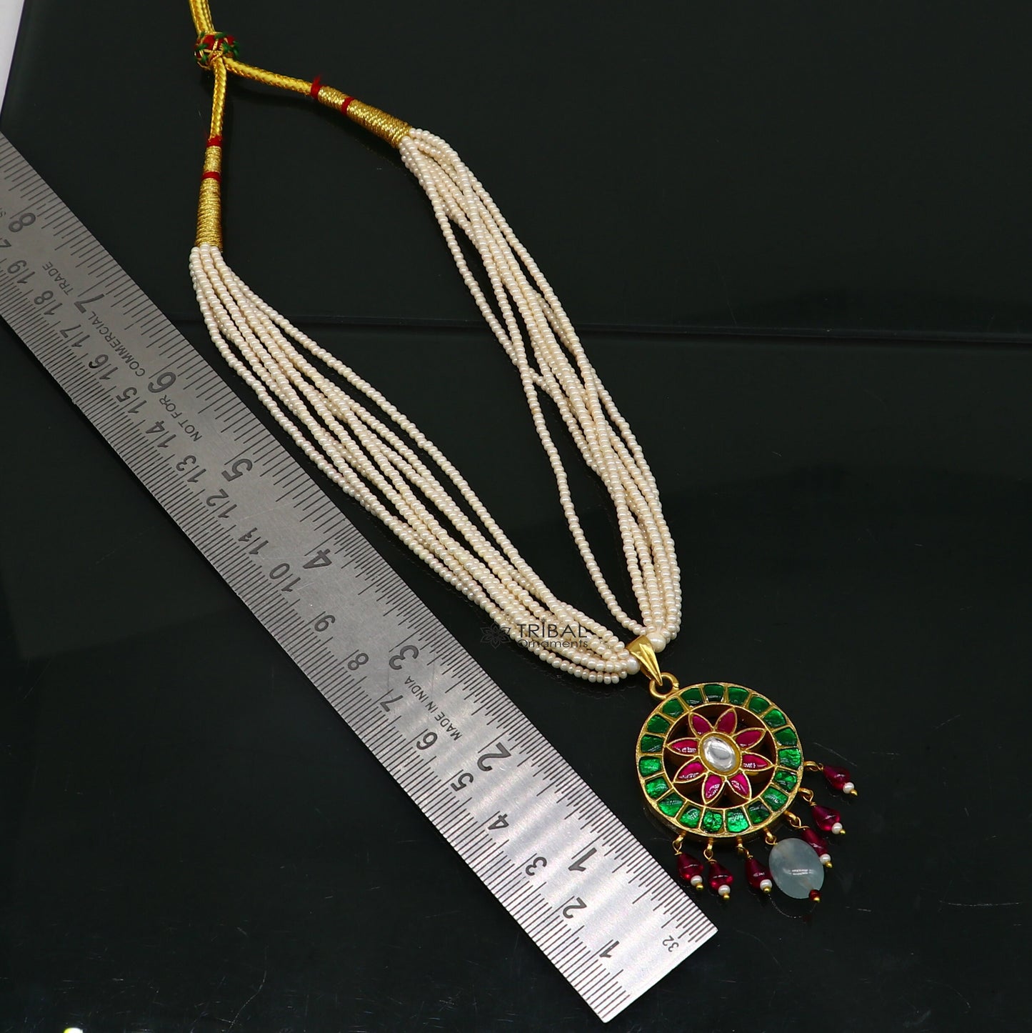 Sterling silver Indian traditional kundan work pendant necklace with multiple pearl strands, ideal for bridal jewelry.