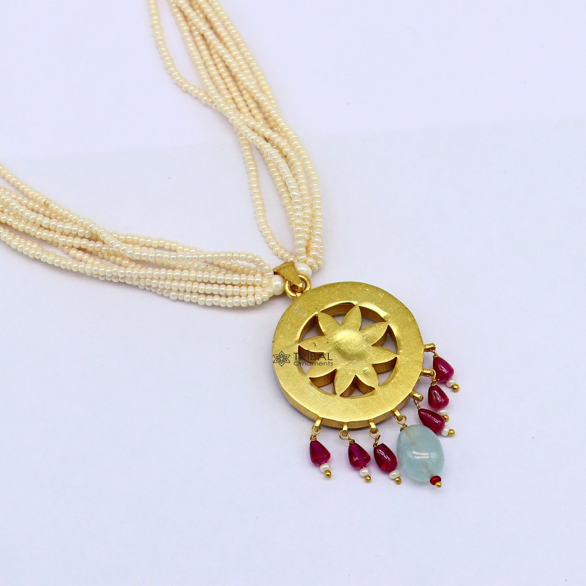 Sterling silver Indian traditional kundan work pendant necklace with multiline pearl strings, ideal for brides and cultural jewelry.