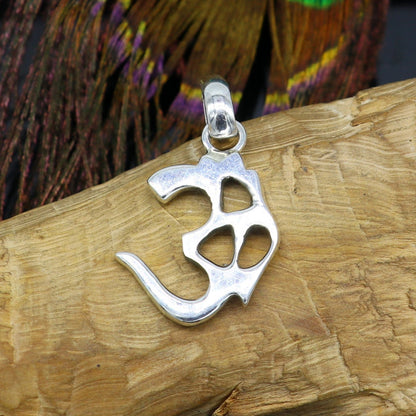 Shiny 925 pure silver Aum OM pendant from TRIBAL ORNAMENTS, featuring a customized ethnic-style jewelry design.