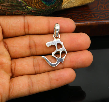 Shiny 925 silver Aum OM pendant by TRIBAL ORNAMENTS, customized ethnic jewelry, perfect for gifting or vintage necklace style.