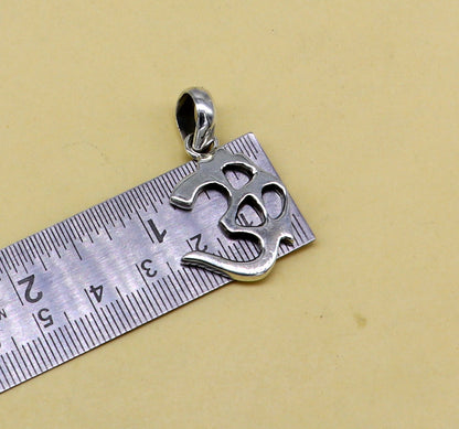 Shiny 925 pure silver Aum/OM pendant from TRIBAL ORNAMENTS, featuring ethnic style and customized design for gifting or jewelry.
