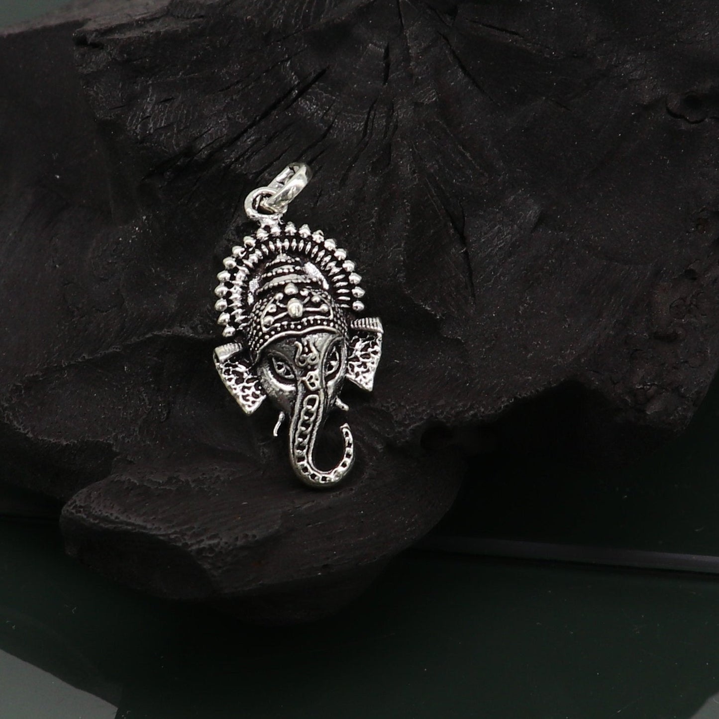 Sterling silver Ganesha idol pendant necklace from Tribal Ornaments, showcasing intricate design and oxidized finish.