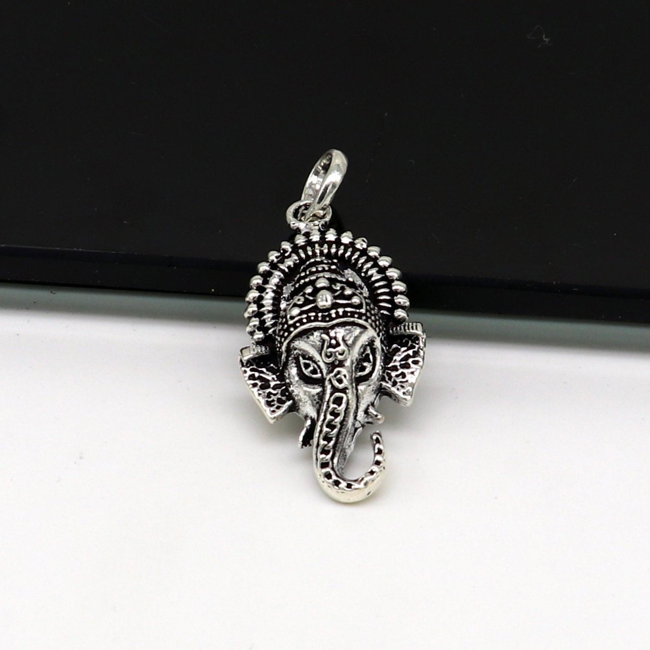 925 silver Ganesha idol pendant necklace by Tribal Ornaments featuring a detailed, stylish design perfect for gifting.