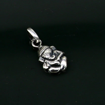 Small 925 silver Ganesha idol pendant from TRIBAL ORNAMENTS, stylish vintage necklace with intricate design for gifting or personal wear.