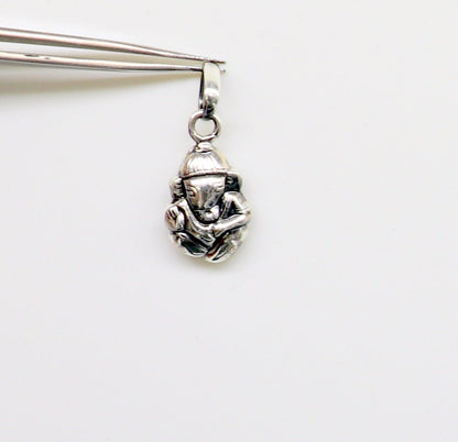925 silver Ganesha idol pendant necklace from TRIBAL ORNAMENTS, small vintage-style personalized Ganesha pendant for gifting.