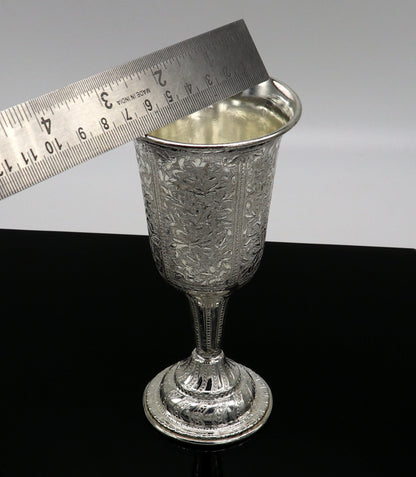 Handmade 925 fine silver vessel and wine glass tumbler by Tribal Ornaments, silver flask and utensils for health and elegance.