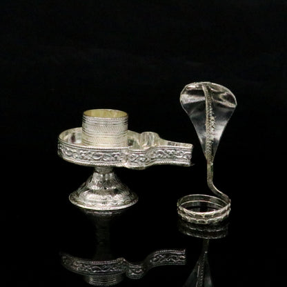 Sterling silver Lord Shiva Lingam stand or Jalheri, handcrafted by Tribal Ornaments, for holding Shiva Lingam in home temple.