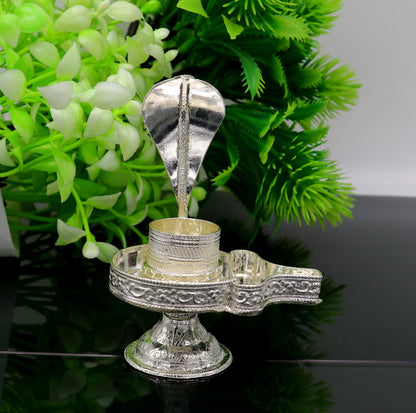 Sterling silver Lord Shiva Lingam stand or Jalheri, handcrafted by TRIBAL ORNAMENTS for holding Shiva Lingam in home temples.