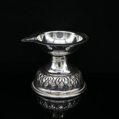 Sterling silver oil lamp with traditional chitai and kandrai work, decorative silver Deepak for puja and temple rituals.