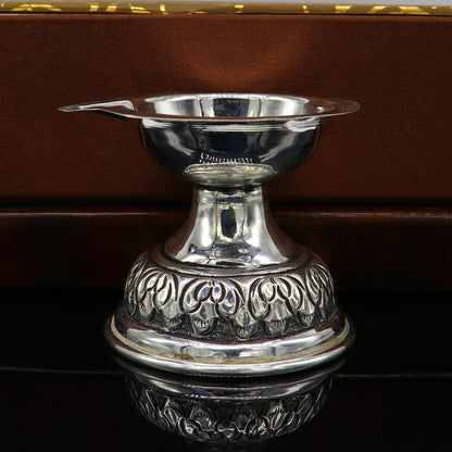Sterling silver oil lamp with intricate chitai and kandrai work, decorative silver Deepak for puja and temple rituals.