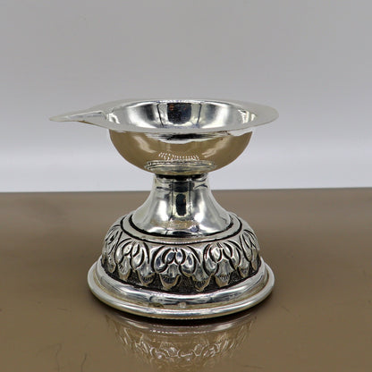 Sterling silver oil lamp with intricate chitai and kandrai work, traditional Deepak for puja and temple decor.
