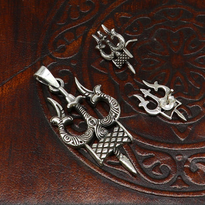 925 silver Shiva idol pendant and stud set featuring a trident design, handmade tribal jewelry for daily wear and gifting.