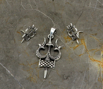 925 silver Shiva idol trident pendant and stud set from TRIBAL ORNAMENTS, featuring handmade designer jewelry for daily wear and gifting.