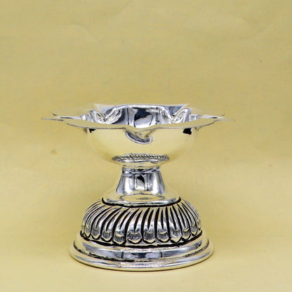 Sterling silver Chitai work oil lamp, traditional silver Deepak for puja, detailed temple art and puja utensils by TRIBAL ORNAMENTS.