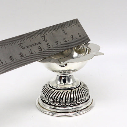Sterling silver oil lamp with chitai and kandrai work design, traditional silver Deepak for puja, temple, and religious rituals.