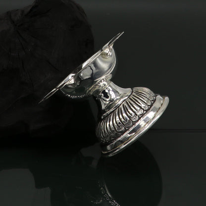 Sterling silver oil lamp with Chitai and Kandrai work design, traditional Deepak temple article for puja rituals.