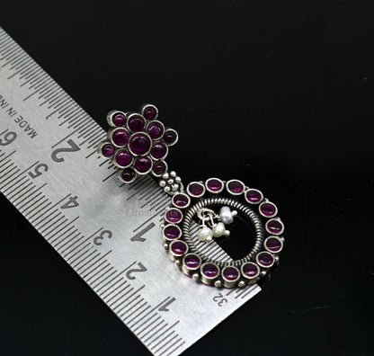 925 silver trendy stud drop earrings with round design, red beads, and pearl accents from TRIBAL ORNAMENTS.