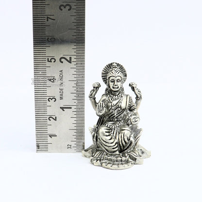 925 silver Goddess Lakshmi statue figurine for puja, representing wealth and prosperity, ideal for Diwali festival worship.
