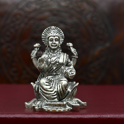925 silver Goddess Lakshmi statue figurine for puja, depicting Lakshmi with traditional design for Diwali worship and prosperity.