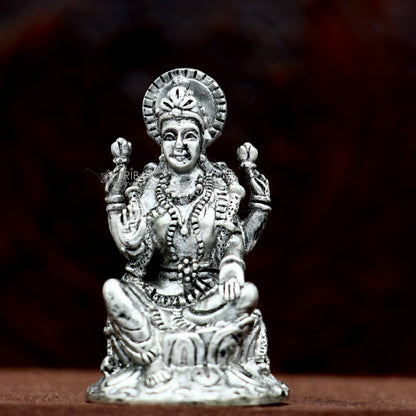925 Silver Goddess Lakshmi figurine for puja, symbolizing wealth and prosperity, ideal for Diwali festival worship.