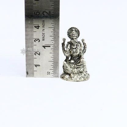 925 silver Goddess Lakshmi statue figurine for puja, ideal for Diwali worship, symbolizing wealth and prosperity.