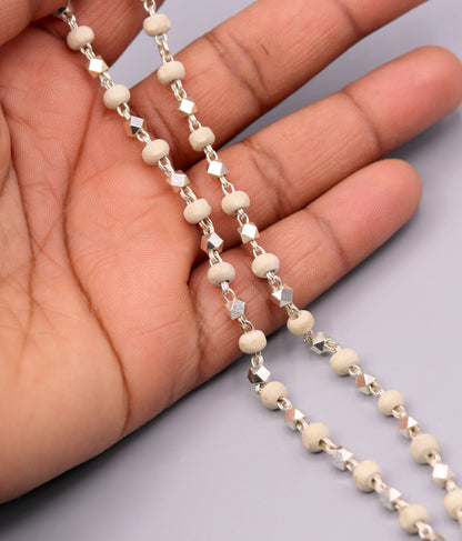 Handcrafted 925 silver Basil rosary beads with silver beads on a necklace chain, used in Ayurveda for protection and focus.