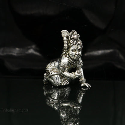925 silver handmade Krishna idol sculpture, small crawling Ladu Gopal statue for home temple puja, crafted by TRIBAL ORNAMENTS.