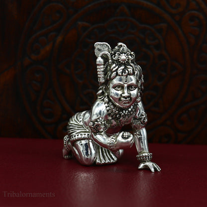 Handmade 925 silver Krishna idol sculpture of crawling Ladu Gopal, small statue for home temple puja, by TRIBAL ORNAMENTS.