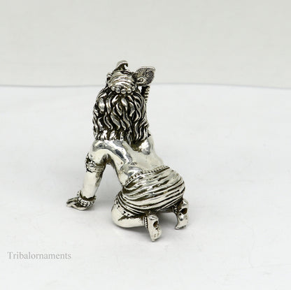 Small handcrafted 925 silver Krishna idol sculpture, crawling Ladu Gopal for home temple puja and decorative art.
