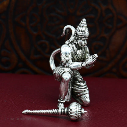 Handmade 925 silver Lord Hanuman statue, 1.5 inches tall, ideal for home temple puja or gifting, featuring intricate tribal craftsmanship.