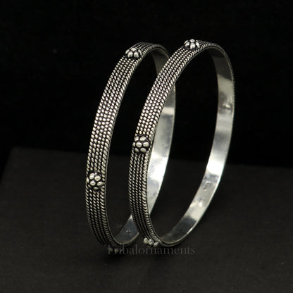 Sterling silver customized bangle bracelet with intricate design, stylish jewelry perfect for gifting or bridesmaids from Tribal Ornaments