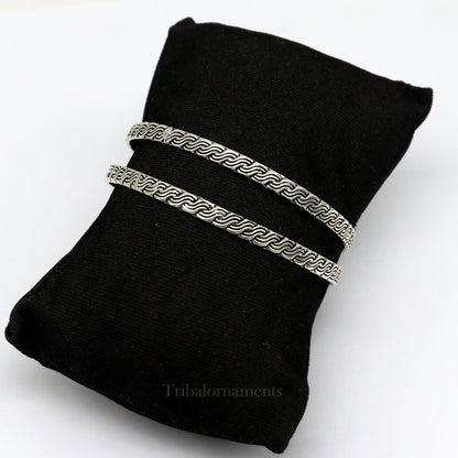 Sterling silver customized bangle bracelet with intricate design, stylish jewelry by Tribal Ornaments, ideal for gifting or bridesmaids.