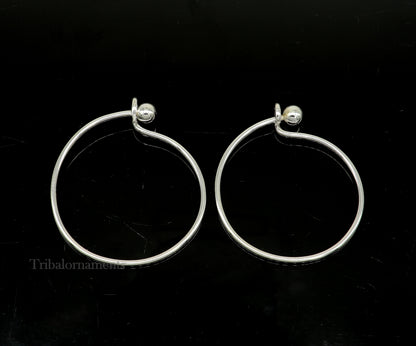 Sterling silver TRIBAL ORNAMENTS bangle bracelet with plain and ball work design, stylish jewelry for gifting or special occasions.