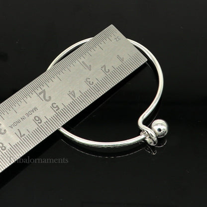Sterling silver TRIBAL ORNAMENTS bangle bracelet with plain ball design, stylish and customized, ideal for gifting or bridal jewelry.