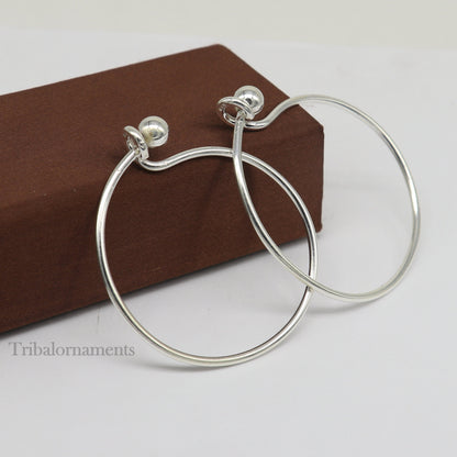 Sterling silver TRIBAL ORNAMENTS bangle bracelet with plain design and ball work, stylish and suitable for gifting or brides.