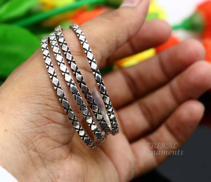 Sterling silver designer bangle bracelet with intricate custom work, perfect for gifting or bridesmaids, by TRIBAL ORNAMENTS.