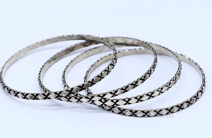 Sterling silver designer bangle bracelet with customized style work, perfect for gifting or bridesmaids, by TRIBAL ORNAMENTS.
