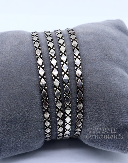 Sterling silver designer bangle bracelet with customized style work, crafted by TRIBAL ORNAMENTS, ideal for gifting or brides.