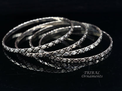 Sterling silver designer bangle bracelet with customized style work, crafted by TRIBAL ORNAMENTS, ideal for gifting or bridesmaids.