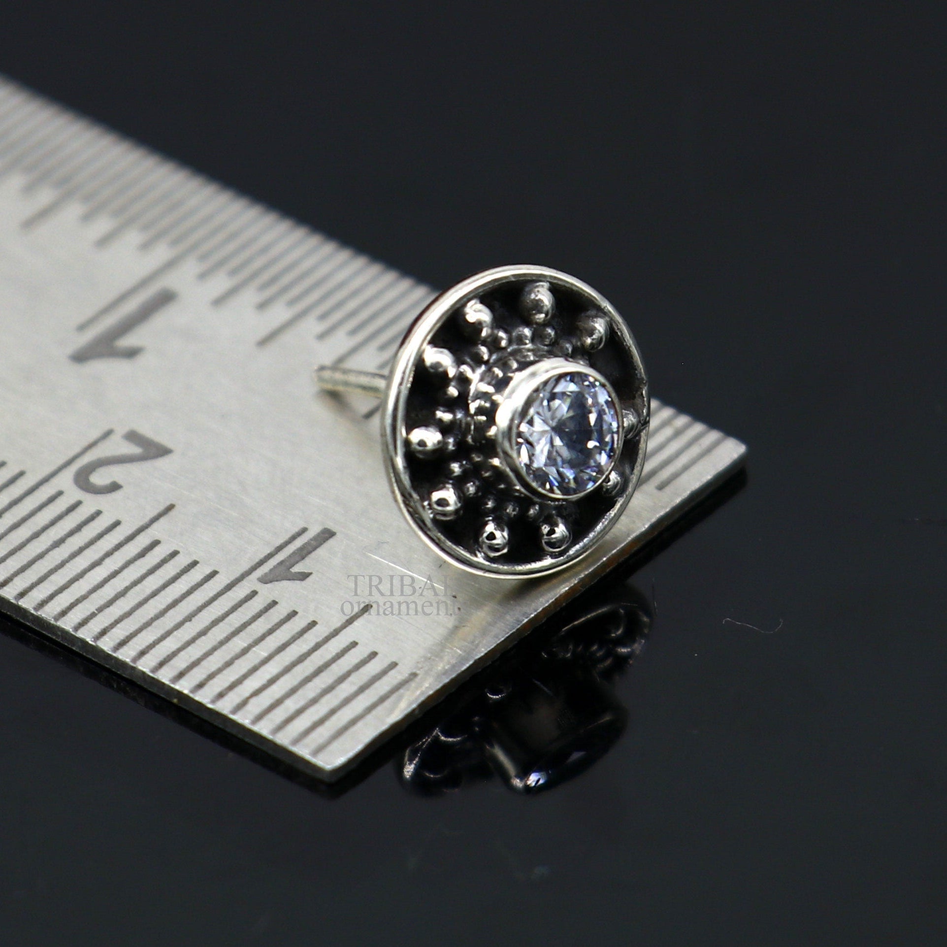 Sterling silver handmade vintage style single CZ stone stud earring, stylish daily wear jewelry from TRIBAL ORNAMENTS India