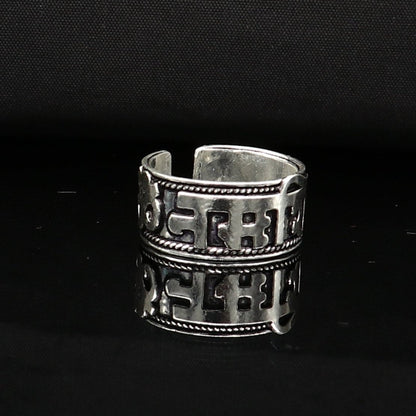 Sterling silver 11mm handcrafted adjustable Shiva mantra thumb ring featuring Aum/Om Namah Shivay symbol, tribal jewelry design.
