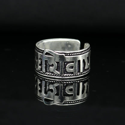 Sterling silver adjustable Shiva mantra thumb ring featuring 11mm solid handcrafted band with divine idol design by Tribal Ornaments.