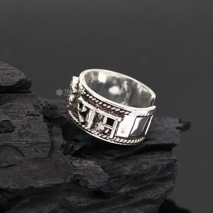 Sterling silver 11mm wide handmade adjustable Rama mantra thumb ring featuring idol Rama and "Jai Shri Ram" inscription.