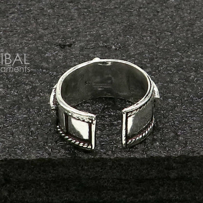 Sterling silver 11mm wide adjustable Rama mantra thumb ring featuring idol Rama design and classic jewelry style by TRIBAL ORNAMENTS.