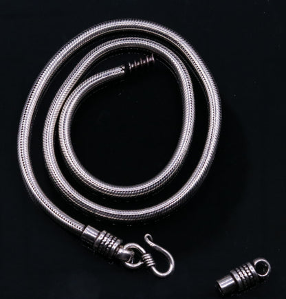 Sterling silver 20-inch flexible snake chain necklace by TRIBAL ORNAMENTS, unisex jewelry with screw clasp, handcrafted and elegant.