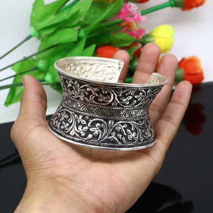 Sterling silver tribal cuff bracelet, adjustable boho ethnic design with intricate patterns, ideal for wedding or Navratri jewelry.